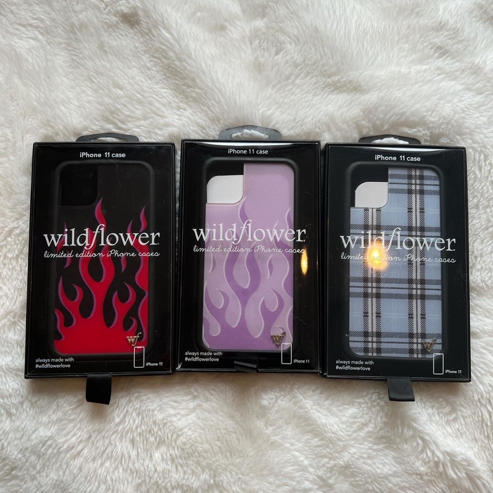 Wildflower cases for iPhone 11, one red and black flames, purple flames, plaid